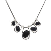 Collar plateado con cristal y lava volcánica